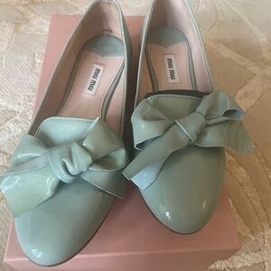 Light Blue Miu Miu flats with bows